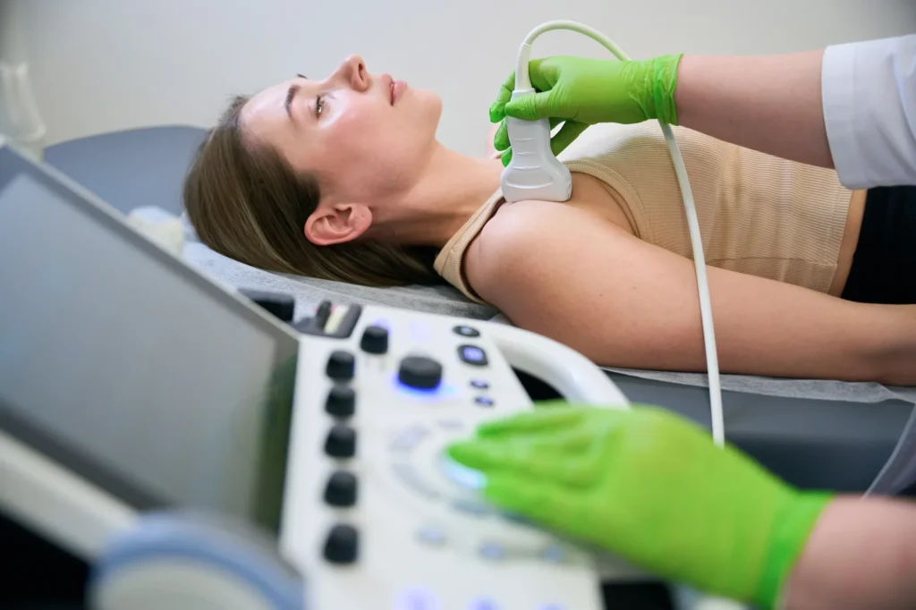 doctor conducting ultrasound scan on young patient 2024 10 20 00 29 27 utc